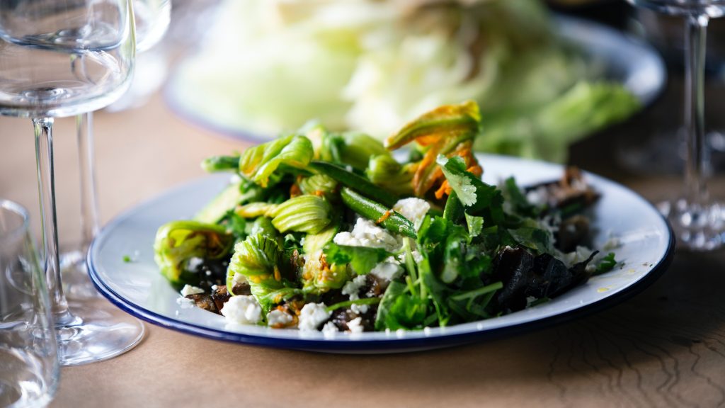 Green salad on plate.